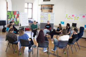 The Austrian EuroPeers are engaged in discussions and collaborative work in the hotel’s Baroque seminar hall in Spital am Pyhrn.